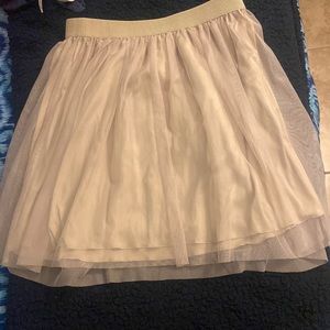 Mid length beige skirt